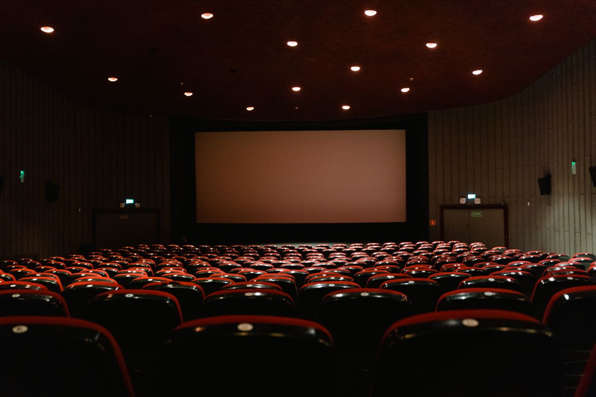 Rows of seats in a quiet movie theater