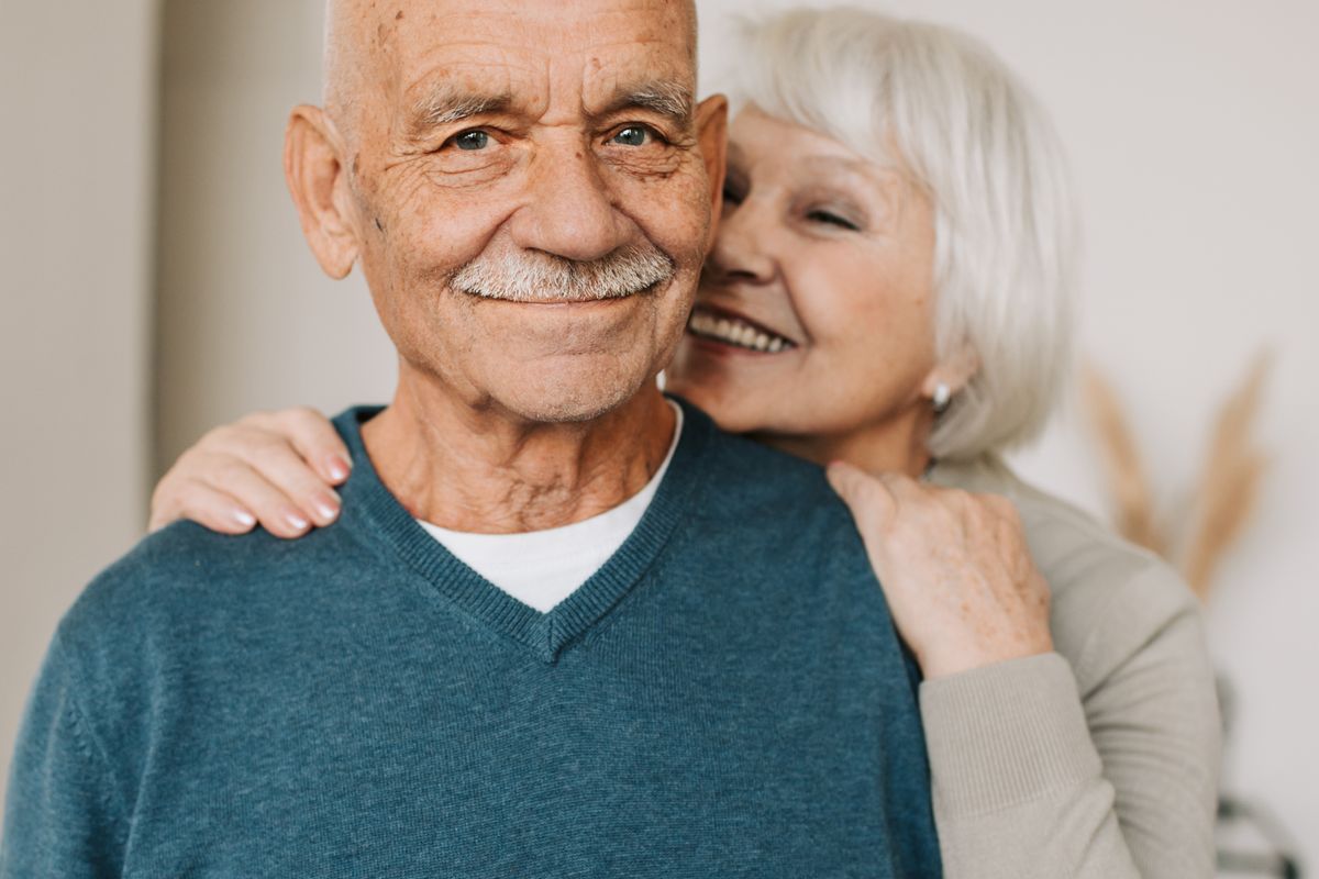 Older adults communicating while using a phone